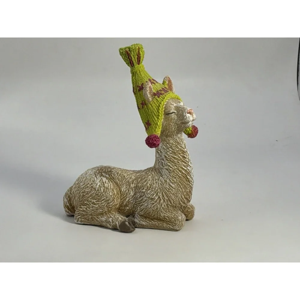 Cute Llama Wearing A Bright Green Stocking Cap Hat